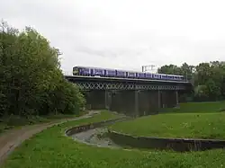 EMU crosses Carr Mill Viaduct St Helens 1st day of electric service Liverpool to Wigan route, May 2015