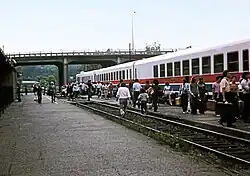 Passengers boarding an Amtrak Turbotrain at Ann Arbor station.