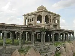 On the Krishnagiri-Two granaries, well for storing ghee,well for storing oil, two temples and an audience chamber.