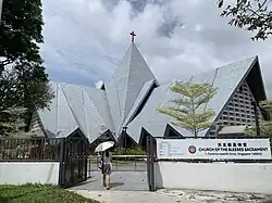 Church of the Blessed Sacrament's most striking feature is the dramatically structured slate roof constructed in folds to symbolise the "tent of meeting" in the Old Testament of the Bible