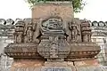 A relief sculpture on a minor shrine on a pedestal in the Ranganathaswamy temple at Srirangapatna