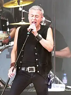Logan performing with Dio Disciples in 2024