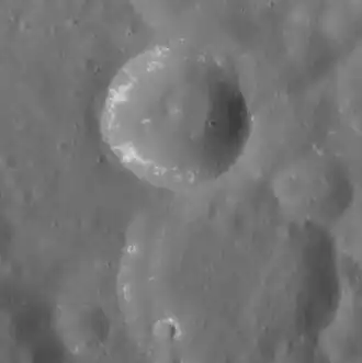 Hollows within a small crater in Kuan Han-Chʽing crater