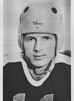 Black and white head shot of Hutson