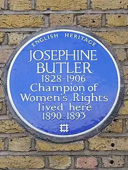 Circular blue plaque with the words "Josephine Butler / 1826–1906 / Champion of / Women's Rights / lived here / 1890–1893"