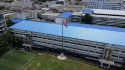 Long, slim building, building 11 on the school campus.