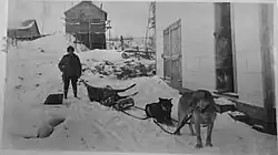 Man with Stag on dog sled, Warehouse, Sanshaw Gold Mine, 1938[6]