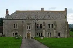Manor Farmhouse with attached range of outbuildings