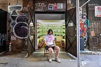 Exterior of Mmuseumm showing a small window with visible objects inside