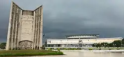 Side view of the Independence Monument with the Palais des congrès de Lomé on the right
