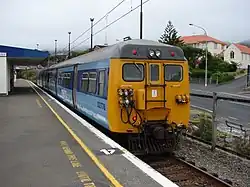 A blue and yellow train at Johnsonville Railway Station in 2007