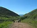 People walking on Tennessee Valley trail to the beach