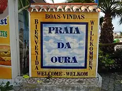 Welcome sign on the promenade to the rear of the beach