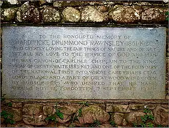 Memorial stone with carved inscription