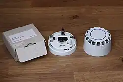 The SMS equivalent of a System 2400 detector and addressable base.