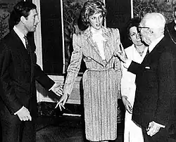 Princess Diana in 1985 wearing a dress with shoulder pads.