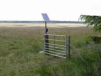 Solar powered electric fence, in Harwood Northumberland, UK.