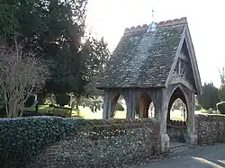 Lychgate and churchyard wall to St Mary's Church