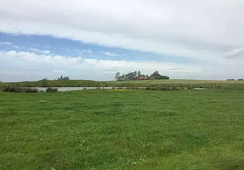 Crater of the 1917 deep mine fired at Kruisstraat, view towards the Spanbroekmolen crater