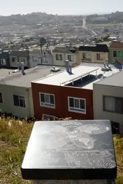 View west to the Excelsior from La Grande Tank, with a "musing stone" from Philosopher's Way in the foreground.