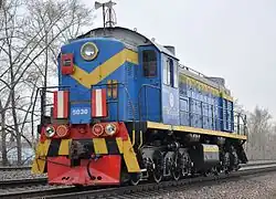 Russian ТЭМ2. Some North Korean units wear the same livery.