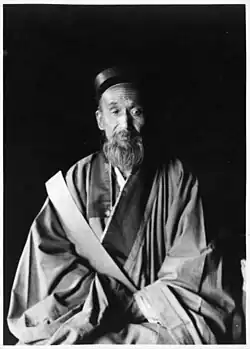 Taoist Priest wearing hechang and daopao, 1931.