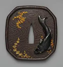 Tsuba with the Koi and Seaweed Motif, made by Kansai. Edo period. The Metropolitan Museum of Art.