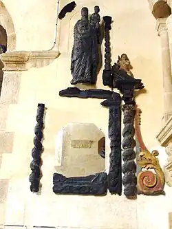 The remains of the original "poutre de gloire" rescued from the fire