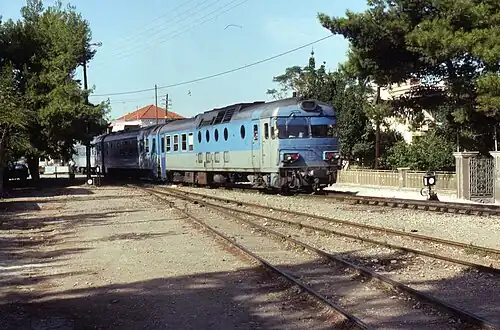 Several Ganz Mavag DMU's pulling into Diakopto on 1 November 1992 is set AA6454, a 4-car version used on long-distance trains, 1 November 1992.