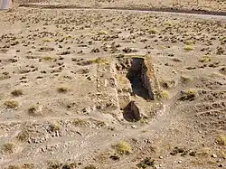 November 4, 2022. A trench from past excavations. The trench is surrounded by numerous looters' pits