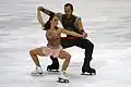 A pair team perform Besti squats during the 2011 World Figure Skating Championships (Maylin Hausch & Daniel Wende)