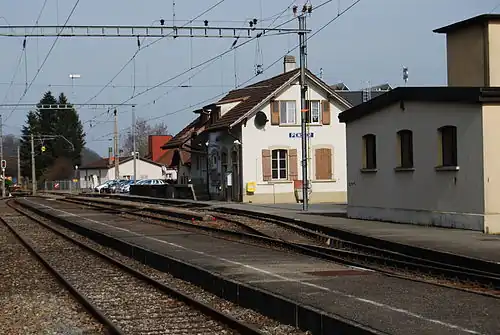 Two-story building with gabled roof