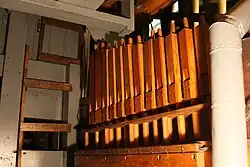 Ranks of 12 square wooden pipes of all sizes inside the organ. These pipes are the extension to the pedal Bourdon 16’ that created the Stopped Flute 8’.