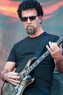 Rombola performing with Godsmack in 2015