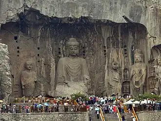 Massive statues at Longmen Grottoes, Henan province, China.