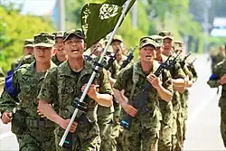 Physical training: 10-mile run with the Ranger flag in the lead