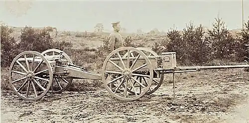 A 6 cm L/21 without shield attached to its limber.