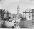 The Albert Clock with electric trams edited onto the previous picture with horse trams.