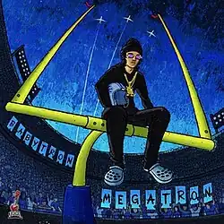 A drawing of a man sitting on a field goal post with an American football helmet in his right arm. Signs in the crowd read the words "BabyTron" and "Megatron", and three planes fly overhead.