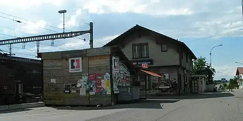 Two-story building with gabled roof