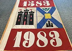 Banner celebrating the University of Edinburgh Quartercentenary in 1986 that had been hanged on the wall of the Sports Hall during the 1986 Commonwealth Games