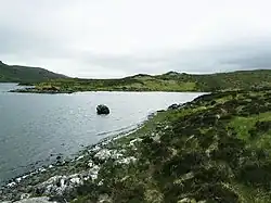 Bay below Creagan Mòr, Loch Veyatie. This sheltered bay was most welcome by a group of anglers on a rather windy day. At the inner end of the bay is the small beach