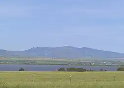 Canyon Ferry Lake in foreground as seen from U.S. Highway 12 near Townsend, Montana. Big Belt Mountains in background.