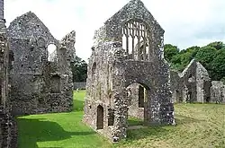 stone walls of a ruined building