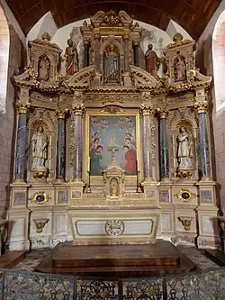Main altar with altarpiece attributed to Caris, Brée