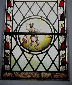St Matthew's Church Bristol. Bunyan Roundel. Christian casts off his burden