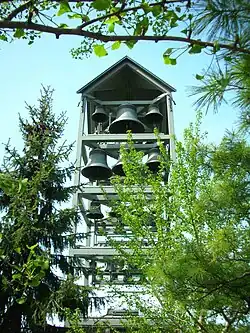 Carillon as seen through the trees.