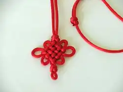 A 4-row panchang knot with cross knots