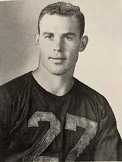 Black and white photograph of Don Doll in an unidentified jersey. The jersey has the number 27 on it and he's shown from about the waist up.