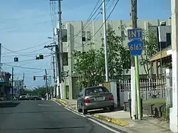 PR-6165 and PR-6693 signs in Dorado barrio-pueblo
